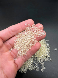 Perles d'encapsulation pour la création de prothèses et de calottes chauves